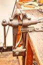 A closeup of an old vise in a workshop. Royalty Free Stock Photo