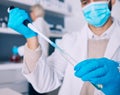 Closeup, vial and hands of a scientist for research of liquid for a chemistry test in a lab. Safety, medicine and a Royalty Free Stock Photo