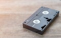 Closeup Video Cassette on wooden table