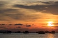 Vietnamese fishing boat silhouettes in sea at sunset Royalty Free Stock Photo