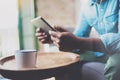 Closeup view of African man working at home while sitting on the sofa.Guy using digital tablet for video conversation Royalty Free Stock Photo