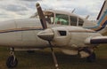 Closeup view of an airplane with two engines in a cloudy day. A small private airfield in Zhytomyr, Ukraine Royalty Free Stock Photo