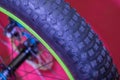 Closeup view of bike wheel. Detail with bike wheel over colorful Royalty Free Stock Photo