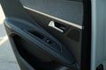 Closeup view of black car door inside modern automobile Royalty Free Stock Photo