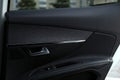 Closeup view of black car door inside modern automobile Royalty Free Stock Photo
