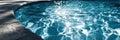 Closeup View of Blue Pool Water Reflecting Sunlight With Calming Ripples Creating an Abstract Surface Pattern Royalty Free Stock Photo