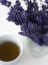 Bouquet of lavender flowers and a cup of tea Royalty Free Stock Photo