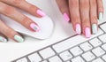 Closeup view of a business woman hands typing on wireless computer keyboard on office table. Soft lightning Royalty Free Stock Photo