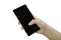 Closeup view of a child`s female hand with fingers holding a black smartphone with touch screen isolated Royalty Free Stock Photo