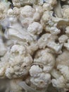 Closeup view of chopped and rinsed white cauliflower , over head view Royalty Free Stock Photo