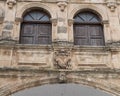 Closeup view coat of arms on The arch of Scoppa, Ostuni, Italy