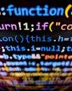 Closeup view of computer code function displayed on pixelated screen with bright colorful words on dark background