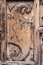 Closeup view of decorative element on old vintage wooden door Royalty Free Stock Photo