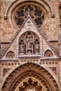 A closeup view of the decorative elements of a cathedral