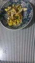 Closeup view of fried egg omelet dish in a fry pan