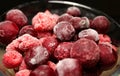 Closeup View Of Frozen Mixed Fruit Berries In A Glass Stock Photo