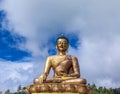 Closeup view of giant Buddha Dordenma statue with the blue sky and clouds background, Thimphu, Bhutan Royalty Free Stock Photo