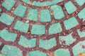 Closeup view on a green cobblestone road - circle pattern, background Royalty Free Stock Photo