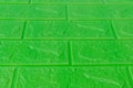 Closeup view of a green foam bricks wall background