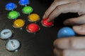 Closeup view of hands playing arcade old video games.Gamepad with joystick and many colorful buttons .Gaming with old retro Royalty Free Stock Photo