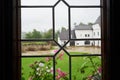 Closeup view from historic window from medieval age to the courtyard.