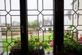 Closeup view from historic window from medieval age to the courtyard.