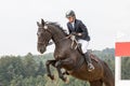 Closeup view of horsewoman jump