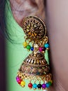 Indian woman ear hangings jewelry