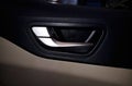 Closeup view of inner Car door Handle Royalty Free Stock Photo