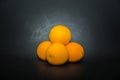 closeup view of juicy sweet appetizing oranges isolated on dark