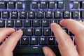 Closeup view of a keyboard with bright led lights for easy and comfortable using pc or notebook. High Tech concept.