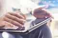 Closeup view of man holding digital tablet on hand and using electronic pen while working at office.Pointing tablet Royalty Free Stock Photo