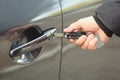 Closeup view of man opening car door Royalty Free Stock Photo