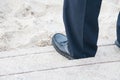 closeup view of man's leather black shoes,Businessman walking to the office Royalty Free Stock Photo