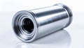 Shiny silver metal cylinder with threaded end and hollow center on white surface Royalty Free Stock Photo