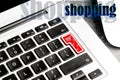 Closeup view of Laptop keyboard with cart symbol on table. Internet shopping Royalty Free Stock Photo