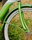 Closeup View of Neon Green Bicycle Frame and White Wall Tire