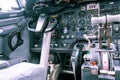 Old aircraft cockpit with yoke and knobs. Royalty Free Stock Photo