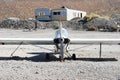 Closeup view of an old broken propeller of a small white helicopter