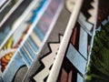 Closeup view of an old comic book collection creates colorful background paper texture with abstract shapes