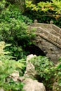 Closeup view of an old stone bridge in the garden in historic  Wuzhen town Royalty Free Stock Photo