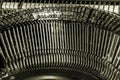 Closeup view of old typewriter mechanism. Metal typebars with Russian letters Royalty Free Stock Photo