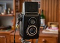 Closeup view of an old used TLR twin-lens reflex antique camera Royalty Free Stock Photo