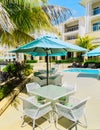 closeup view of outdoor patio furniture and grounds at Angsana luxury hotel, on sunny gorgeous day