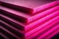 Closeup View of Pink Insulation Foam Sheets Exploring Textural Details in LowLight Conditions for Building Materials