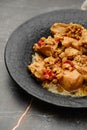 Closeup view of plate with chicken stew with walnuts Royalty Free Stock Photo