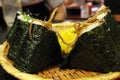 Closeup view of plate of Onigiri or riceball and beer at Kaniya Honten restaurant in Nagasaki Royalty Free Stock Photo
