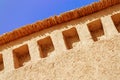 Rammed earth wall with beautiful blue sky