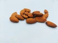 closeup view of raw almonds isilated in white background