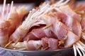 Closeup View of Raw Bacon with Enoki Mushroom on Plate Ready for Barbecue